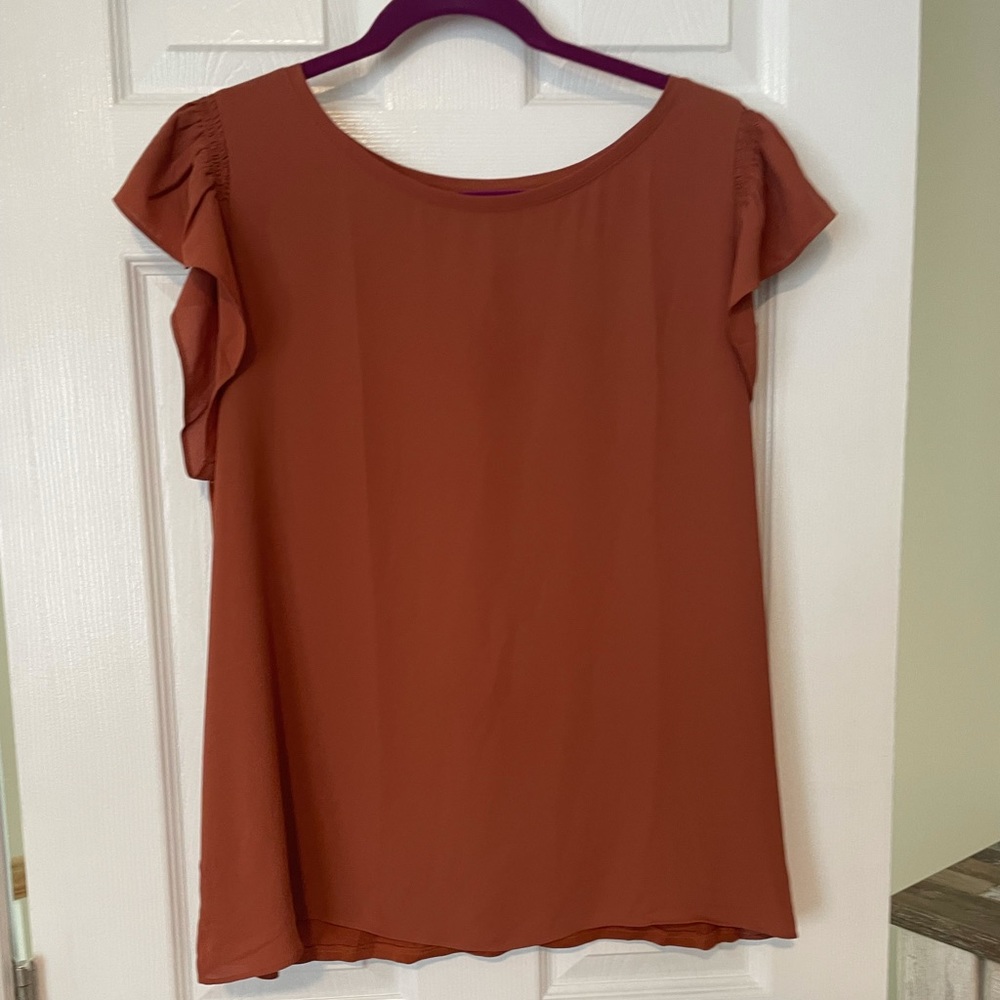 Burnt orange mixed media ruffle blouse